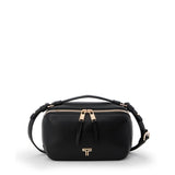 Black Tumi Voyageur Berlin crossbody bag with light gold accents, featuring adjustable strap and compact, stylish design.
