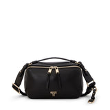 Black Tumi Voyageur Berlin crossbody bag with gold accents, showcasing its compact design and adjustable strap.