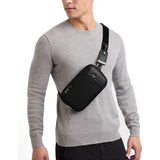 Tumi Arrivé Messina Utility Pouch sling bag with adjustable strap and multiple compartments, made of durable material.