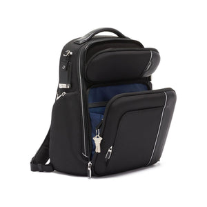 Tumi Arrivé Barker Backpack in black with multiple compartments and adjustable straps, designed for stylish everyday use.