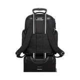 Tumi Arrivé Barker Backpack in black with adjustable shoulder straps and multiple compartments, designed for travel and daily use.