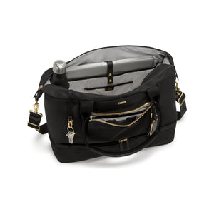 Tumi Voyageur Contine Weekender duffel bag in durable fabric with leather accents, showing side view and handles.