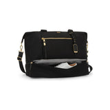 Tumi Voyageur Contine Weekender duffel bag in durable fabric with leather accents and top handles, designed for travel and weekend trips.