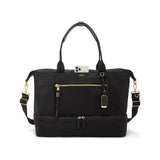 Tumi Voyageur Contine Weekender duffel bag in durable fabric with leather accents, shown in a spacious travel setting.