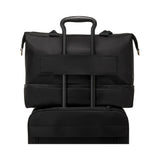 Tumi Voyageur Contine Weekender duffel bag in sleek fabric with leather accents, showing the spacious open interior and sturdy handles.