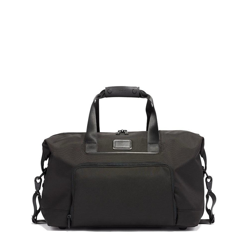 Tumi Alpha double expansion travel satchel duffel bag with sturdy handles and spacious main compartment, black leather accents.