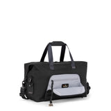 Tumi Alpha double expansion travel satchel, a sturdy black duffel bag with multiple zip compartments and double expansion design.