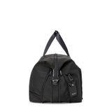 Tumi Alpha double expansion travel satchel with sturdy handles and spacious main compartment, ideal for versatile duffel bag travel.