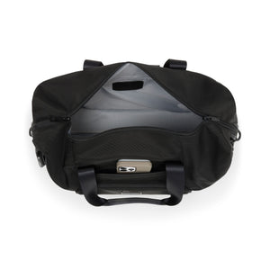 Tumi Alpha Double Expansion Travel Satchel duffel bag with sturdy handles and spacious interior for travel essentials.