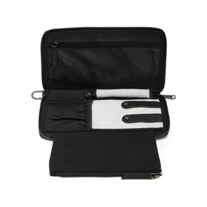 Tumi Voyageur Vevay Jewelry Portfolio case with multiple compartments for organizing jewelry, in sleek fabric with leather accents.