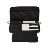 Tumi Voyageur Vevay Jewelry Portfolio case with multiple compartments for organizing jewelry, in sleek fabric with leather accents.