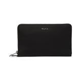 Tumi Voyageur Vevay Jewelry Portfolio jewelry case with multiple compartments and a sleek, tan leather exterior.