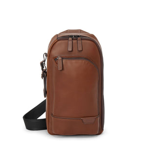 Tumi Harrison Gregory Sling bag with adjustable strap and multiple compartments, made of durable materials for everyday use.