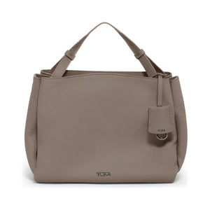 Taupe Tumi Georgica Marylea crossbody bag with adjustable strap and multiple compartments, displayed on a plain background.