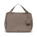 Taupe Tumi Georgica Marylea crossbody bag with adjustable strap and multiple compartments, displayed on a plain background.