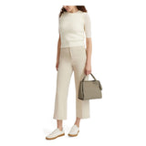 Tumi Georgica Marylea Crossbody bag in taupe leather with adjustable strap and silver hardware.