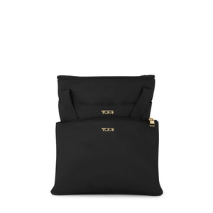 Tumi Voyageur Just in Case Tote bag in durable fabric with leather handles and multiple compartments for organized carrying.
