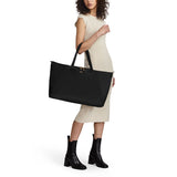 Tumi Voyageur Just in Case Tote bag showing sturdy fabric, spacious interior, and stylish design with handles and zipper closure.