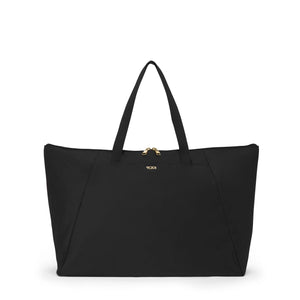 Tumi Voyageur Just in Case Tote Bag in durable fabric with zipper closure and shoulder straps, designed for versatile carrying.