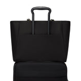 Tumi Voyageur Valetta large tote bag in black with spacious interior and sturdy handles, ideal for daily use and travel.