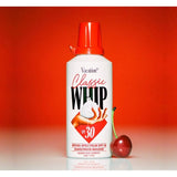 Bottle of Vacation Classic Whip SPF 30 sunscreen with white cap and label, showing the product's packaging and branding.
