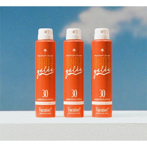Vacation Orange Gelée SPF 30 sunscreen in a jar, showing the bright orange gel texture and product label.