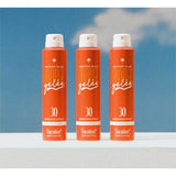 Vacation Orange Gelée SPF 30 sunscreen in a jar, showing the bright orange gel texture and product label.