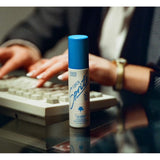 Vacation Super Spritz SPF 50 sunscreen spray, clear bottle with blue cap, designed for sun protection and easy application.