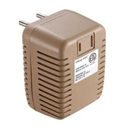 Voltage Valet 50 Watt voltage converter, compact device with input and output ports for travel and electronic device compatibility.