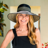 Black Marseille UPF 50+ packable hat by Wallaroo Hat Company, designed for sun protection and easy packing for travel.