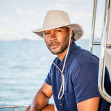 Khaki Wallaroo Hat Company Summit UPF 50+ bucket hat with wide brim and adjustable strap for sun protection.