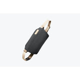 Bellroy Sling Mini bag in sleek, compact design with adjustable strap and multiple compartments for everyday essentials.