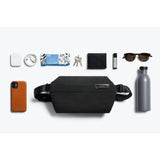 Bellroy Sling Mini bag shown with adjustable strap, compact design, and multiple compartments for everyday essentials.