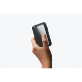 Black Bellroy Flip Case wallet with multiple card slots and sleek design, showcasing its slim, minimalist style.