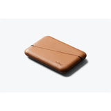 Black Bellroy Flip Case wallet with multiple card slots and sleek design, showcasing its compact and stylish wallet interior.