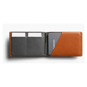 Bellroy travel wallet in caramel leather, showing multiple card slots and cash compartment for organized travel essentials.