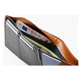 Bellroy travel wallet in caramel leather, showcasing multiple card slots and a slim, organized design for travel essentials.