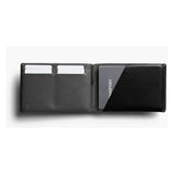 Bellroy travel wallet in caramel leather showing multiple card slots and a spacious cash compartment.