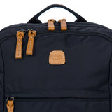 Bric's X-Collection Nomad backpack in durable fabric with leather accents, featuring multiple compartments and adjustable straps.