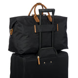 Bric's X-Collection 22-inch Deluxe Duffle Bag with leather accents and extended zipper for travel convenience.