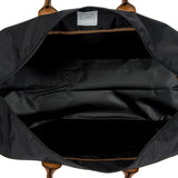 Bric's X-Collection 22-inch Deluxe Duffle bag in durable fabric with leather accents, featuring a zipper closure and carry handles.