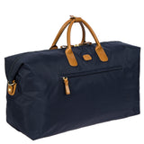 Bric's X-Collection 22-inch Deluxe Duffle bag in beige with leather accents and sturdy handles for travel and storage.