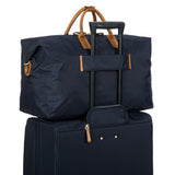 Bric's X-Collection 22-inch Deluxe Duffle bag in durable fabric with leather accents and a spacious main compartment.