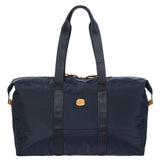 Bric's X-Collection 22-inch folding duffle bag in durable fabric with handles and zipper closure.