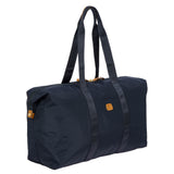 Bric's X-Collection 22-inch folding duffle bag in durable fabric with handles and zipper closure, designed for travel and storage.
