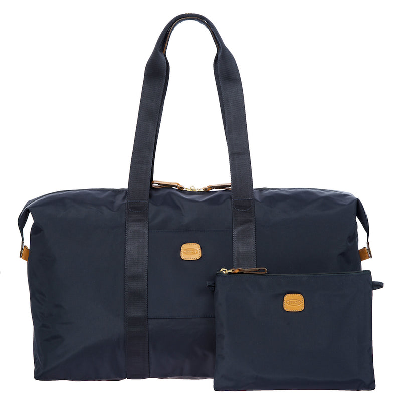Bric's X-Collection 22-inch folding duffle bag with durable fabric and multiple zipper compartments, shown in a neutral color.