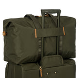 Bric's X-Collection 22-inch folding duffle bag in durable material with handles and zipper closure.