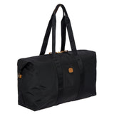 Bric's X-Collection 22-inch folding duffle bag with durable fabric and adjustable shoulder strap, shown in black.