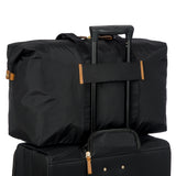 Bric's X-Collection 22-inch folding duffle bag with durable fabric, handles, and a zip closure, ideal for travel and storage.