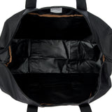 Bric's X-Collection 22-inch folding duffle bag with black fabric, sturdy handles, and zipper closure, designed for travel.